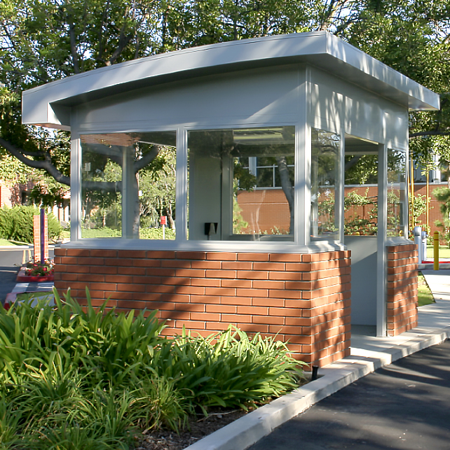 Guard Booth featuring arched roof design and factory Prep for on site application of brick to match their facility